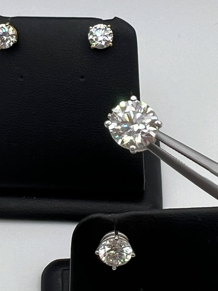 A bad picture of beautiful real diamond earrings in white gold