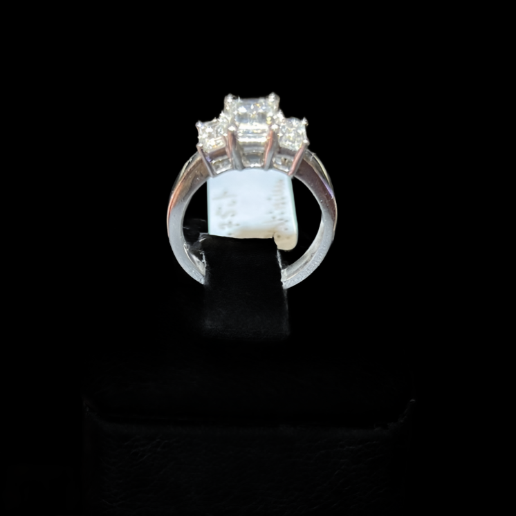 1.75 ct Center Stone Emerald Cut Diamond H VS2 Set in Platinum with 2 side diamonds. 