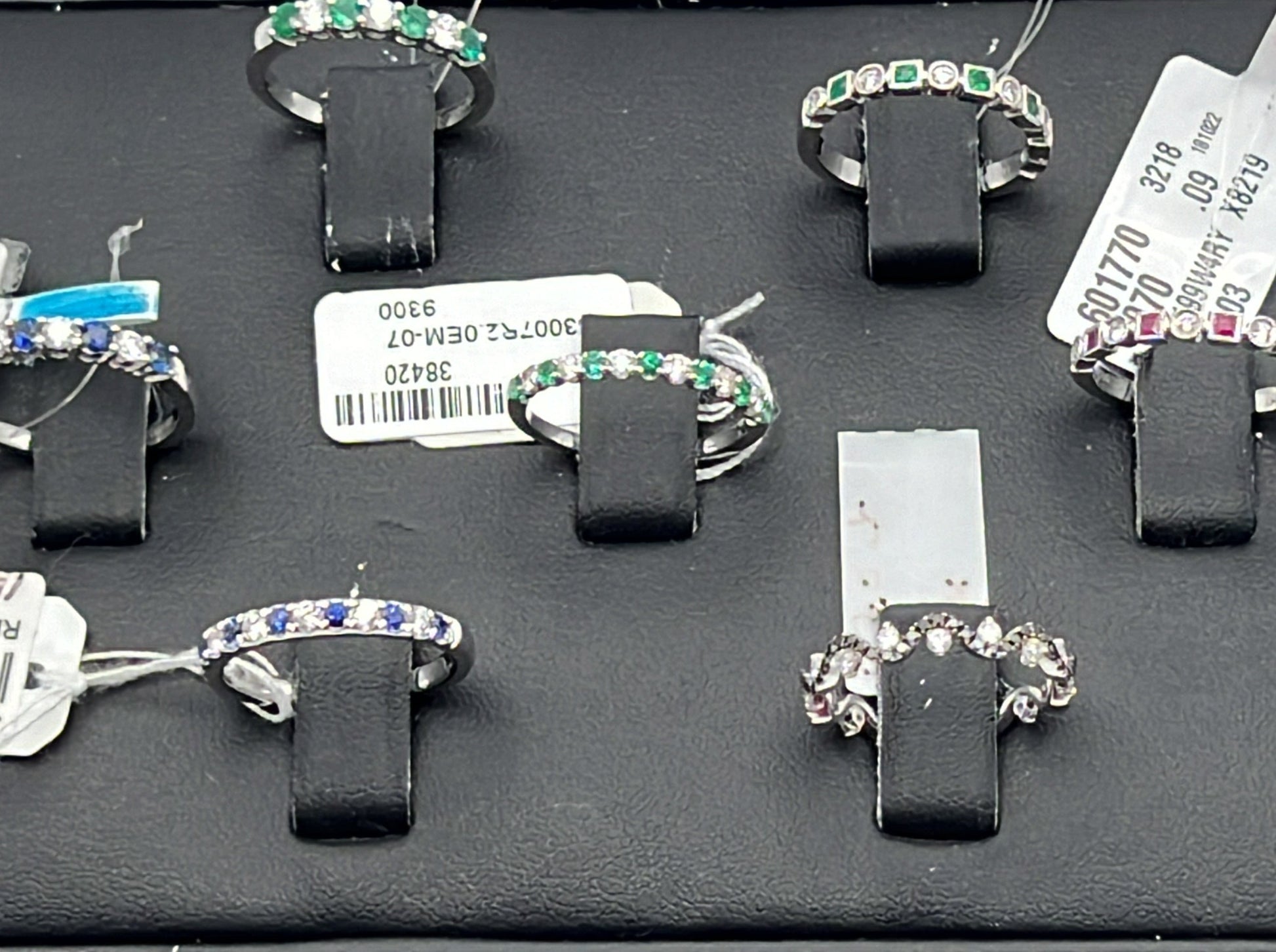 Pretty rings with diamonds and colored stones in white gold